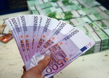 What is a foreign exchange dealer